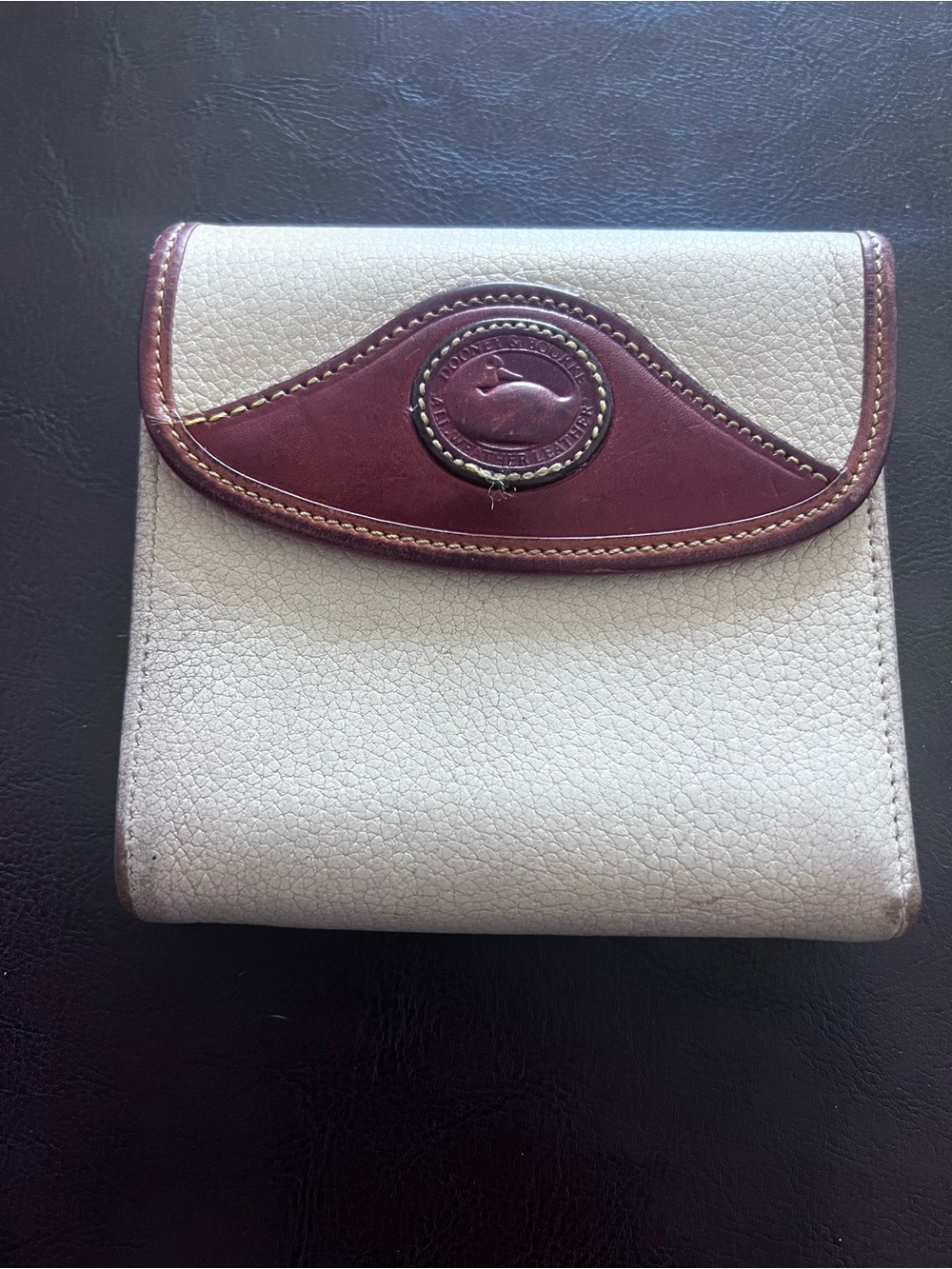 Dooney & Bourke Cream Pebbled Leather Wallet with Brown Trim